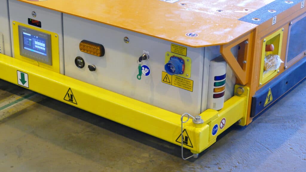 Close-up of a 100,000 lb. AGV, used in Material Handling Solutions for the Power-Gen Industry.