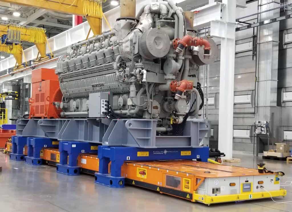 When choosing the right Automated Guided Vehicle manufacturer customization and scalability is a must. For example, in this image we can see a 200,000 lb. AVG enabled thanks to the combination of two 100,000 lb. MGV’s.