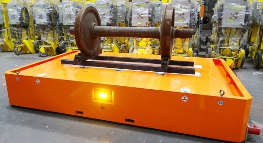 Thanks to AVGs it is easier for manufacturers to do their jobs and load huge parts like this set of wheels. This, and many more, is one of the benefits of using Automated Guided Vehicles in Manufacturing