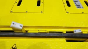 Wheel chocks for powered rail turntable