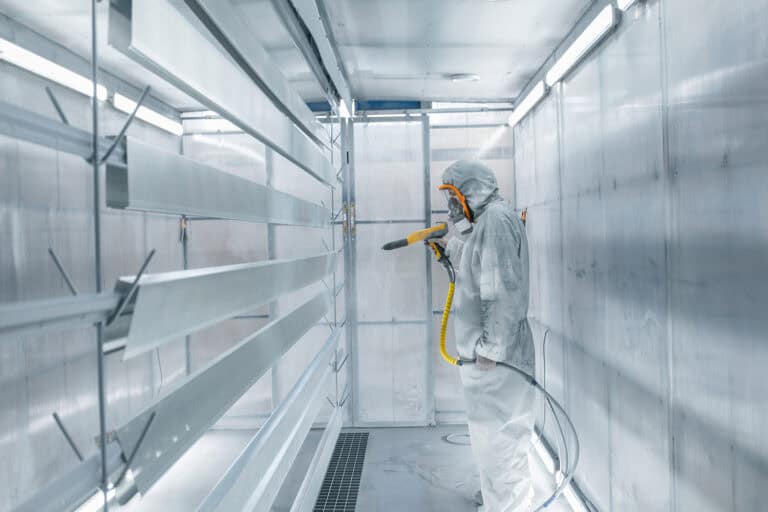 painting parts in powder coating booth