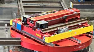 Rail guided vehicle on turntable system